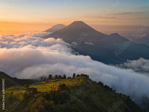 the beautiful view of volcanoes; Sindoro & Sumbing Volcanoes in Java Island during sunrise.