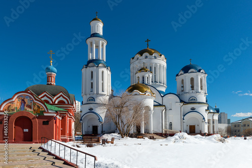 St. Sergius of Radonezh Church in Bibirevo and the Church of the Cathedral of Moscow Saints in Bibirevo on a winter day photo