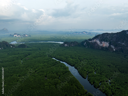 Obraz na płótnie View from above, aerial shot, stunning view of Ao Phang Nga (Phang Nga Bay) National Park featuring a multitude of limestone formations rising from the sea. Thailand. w salonie