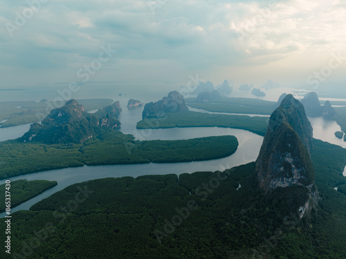 Obraz na płótnie View from above, aerial shot, stunning view of Ao Phang Nga (Phang Nga Bay) National Park featuring a multitude of limestone formations rising from the sea. Thailand. w salonie