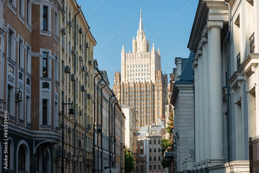 Obraz premium Buildings in Krivoarbatsky Lane and the high-rise of the Ministry of Foreign Affairs, Arbat district in Moscow