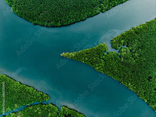 Obraz na płótnie View from above, aerial shot, stunning view of Ao Phang Nga (Phang Nga Bay) National Park with a river flowing through a mangrove forest Thailand. w salonie