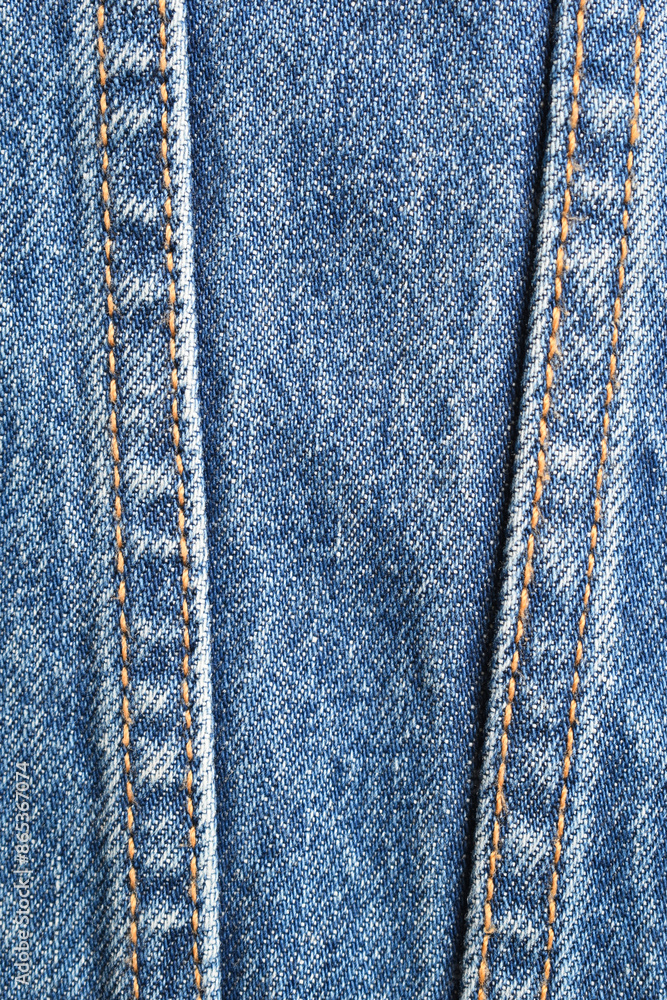 seam of blue denim texture background, jean fashion style seam of blue denim texture background, jean fashion style