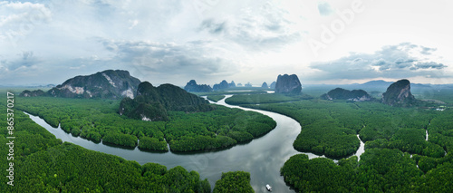 Obraz na płótnie View from above, aerial shot, stunning panoramic view of Ao Phang Nga (Phang Nga Bay) National Park featuring a multitude of limestone formations rising from the sea. Thailand.. w salonie