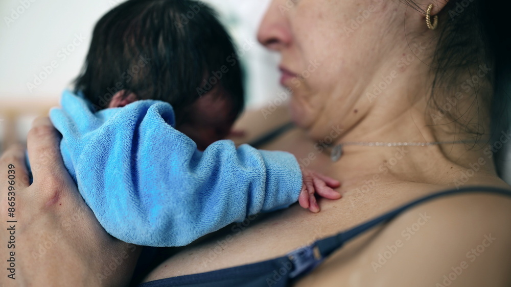 Close-up of a newborn baby resting on mother's chest, highlighting tender moments of early bonding, healthcare setting, postnatal care, emotional connection, new family, nurturing love Close-up of a newborn baby resting on mother's chest, highlighting tender moments of early bonding, healthcare setting, postnatal care, emotional connection, new family, nurturing love