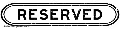 Grunge black reserved word rubber seal stamp on white background