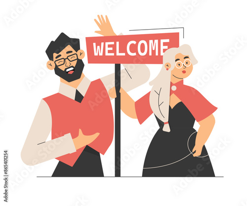 Two characters, a man and a woman, are holding a "Welcome" sign. The man, with a beard and glasses, is gesturing towards the sign, while the woman, with long blonde hair and glasses, stands beside him