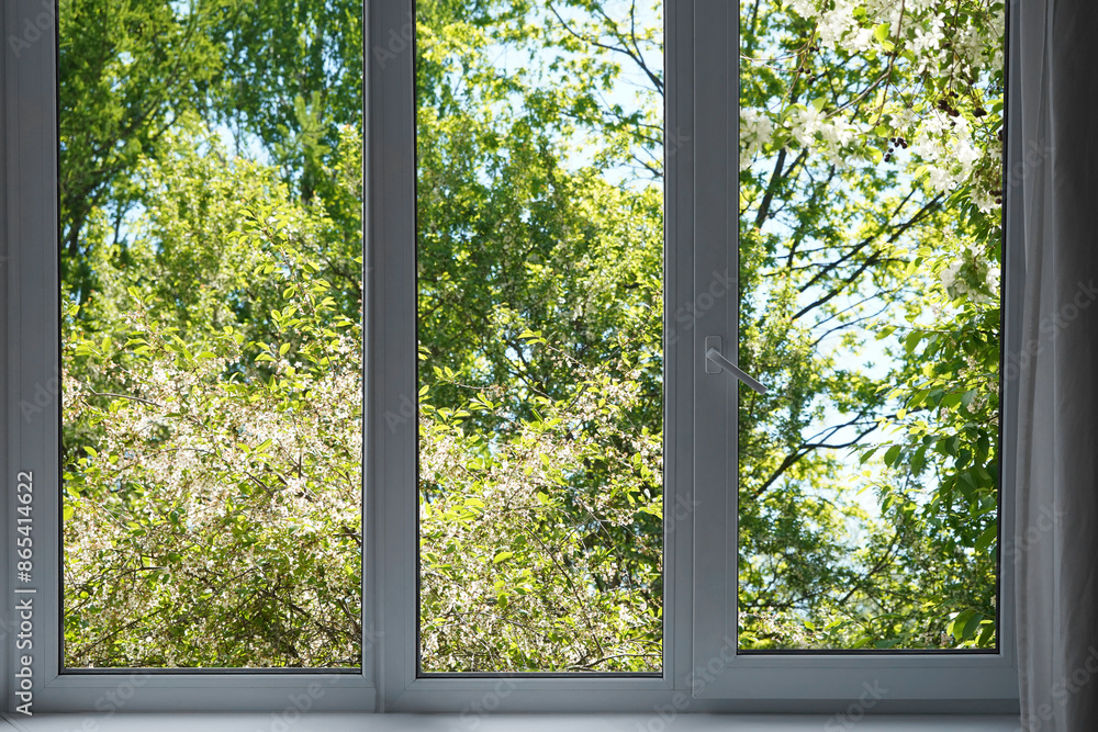 View from the window, green trees, landscape with forest. View from the window, green trees, landscape with forest.