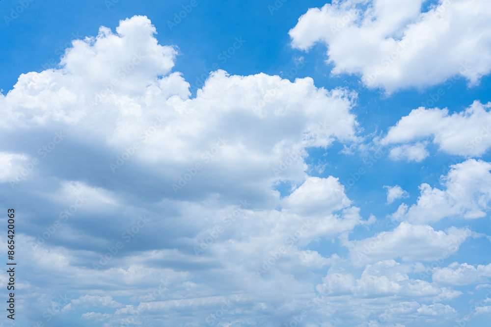 Blue Sky with White Clouds and Sunlight Blue Sky with White Clouds and Sunlight