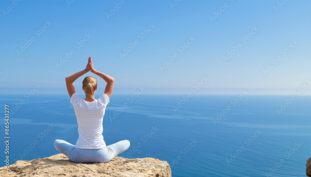 © Wonderful Studio - Woman practicing yoga on a cliff overlooking the sea, summer, tranquility and wellness © Wonderful Studio - Woman practicing yoga on a cliff overlooking the sea, summer, tranquility and wellness