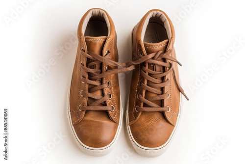 A pair of comfortable travel shoes with a wornin look, isolated on a pristine white background