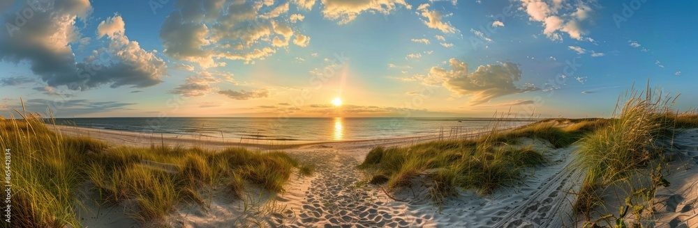 Tranquil sunset on beautiful beach with grass, sand dunes, and ocean for travel and relaxationconcept Tranquil sunset on beautiful beach with grass, sand dunes, and ocean for travel and relaxationconcept