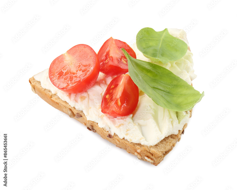 Piece of bread with cream cheese, basil leaves and tomato isolated on white Piece of bread with cream cheese, basil leaves and tomato isolated on white