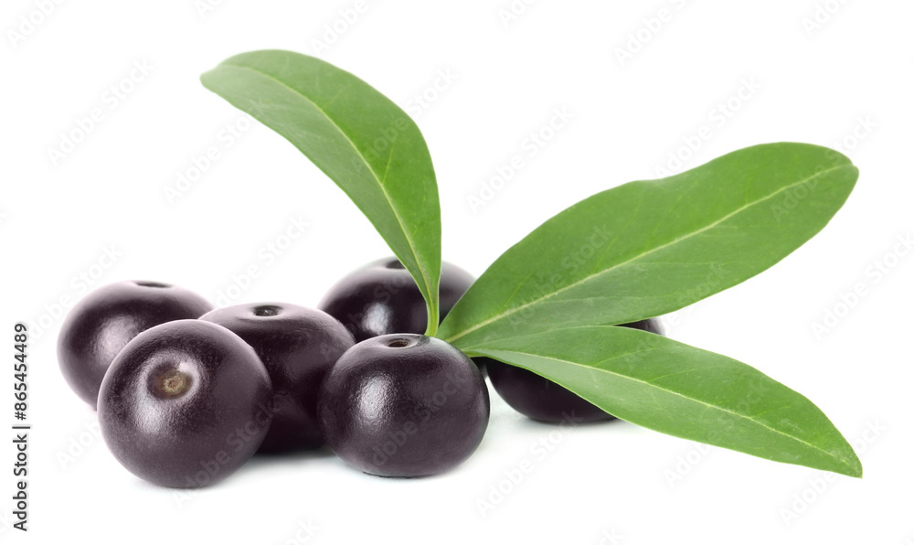 Fresh ripe acai berries and green leaves isolated on white Fresh ripe acai berries and green leaves isolated on white