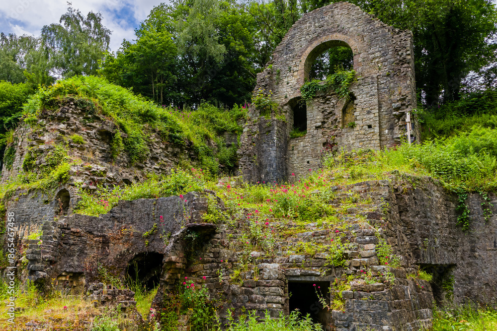 Overgrown ruins of the 1790s built ironworks in Clydach, South Wales, UK Overgrown ruins of the 1790s built ironworks in Clydach, South Wales, UK
