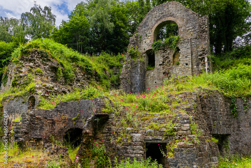 Overgrown ruins of the 1790s built ironworks in Clydach, South Wales, UK photo