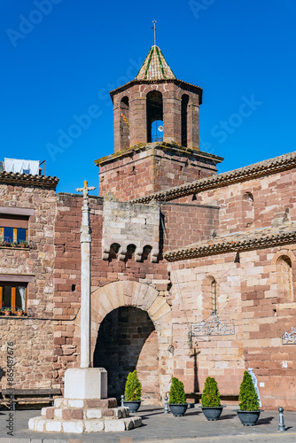 Prades, Catalonia, Spain: Wayside cross and fortified gate in the medieval village