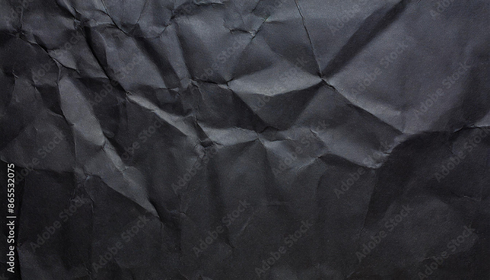 Fototapeta premium crumpled black office craft sheet paper, abstract minimalist luxury texture background wallpaper with space for copy and presentation, waste recycling