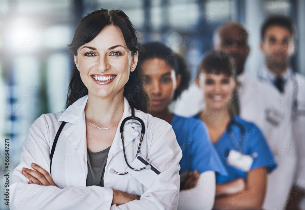Portrait, happy woman or confident doctors with teamwork in hospital for healthcare services or about us. Nursing leadership, medical professional and nurses with pride or trust at wellness clinic Portrait, happy woman or confident doctors with teamwork in hospital for healthcare services or about us. Nursing leadership, medical professional and nurses with pride or trust at wellness clinic