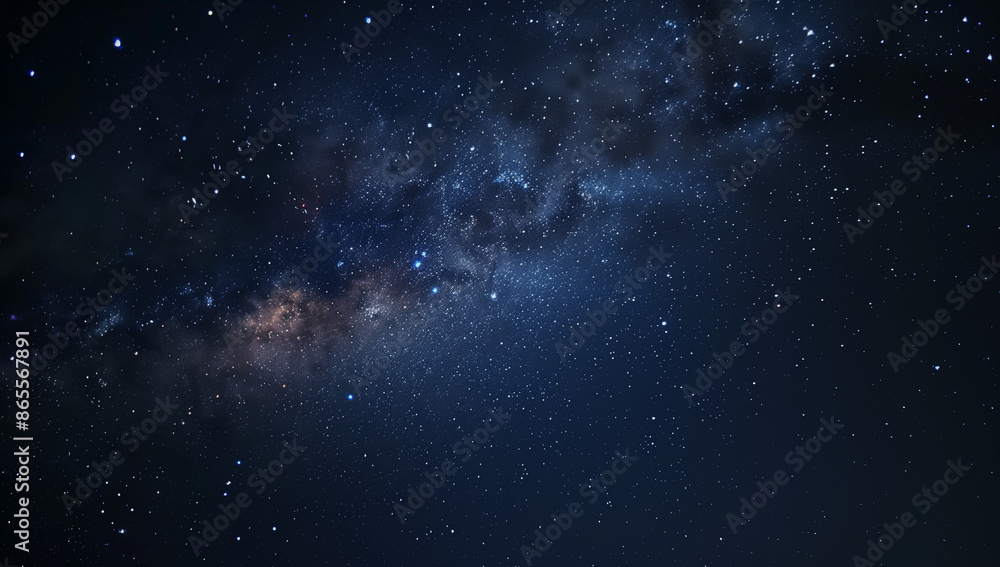 Naklejka premium A dark night sky with stars and the milky way galaxy