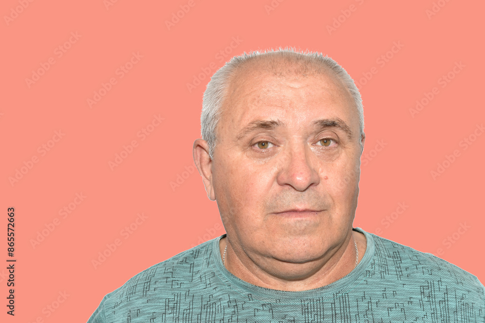 An elderly man with a sad grimace on his face. An elderly man with a sad grimace on his face.