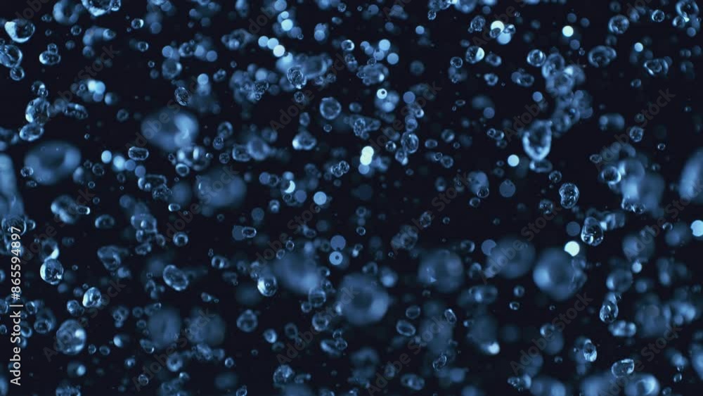 Super Slow Motion of Splashing Water on Black Background with Beautiful Big Water Drops. Filmed on High Speed Cinema Camera, 1000fps. Super Slow Motion of Splashing Water on Black Background with Beautiful Big Water Drops. Filmed on High Speed Cinema Camera, 1000fps.