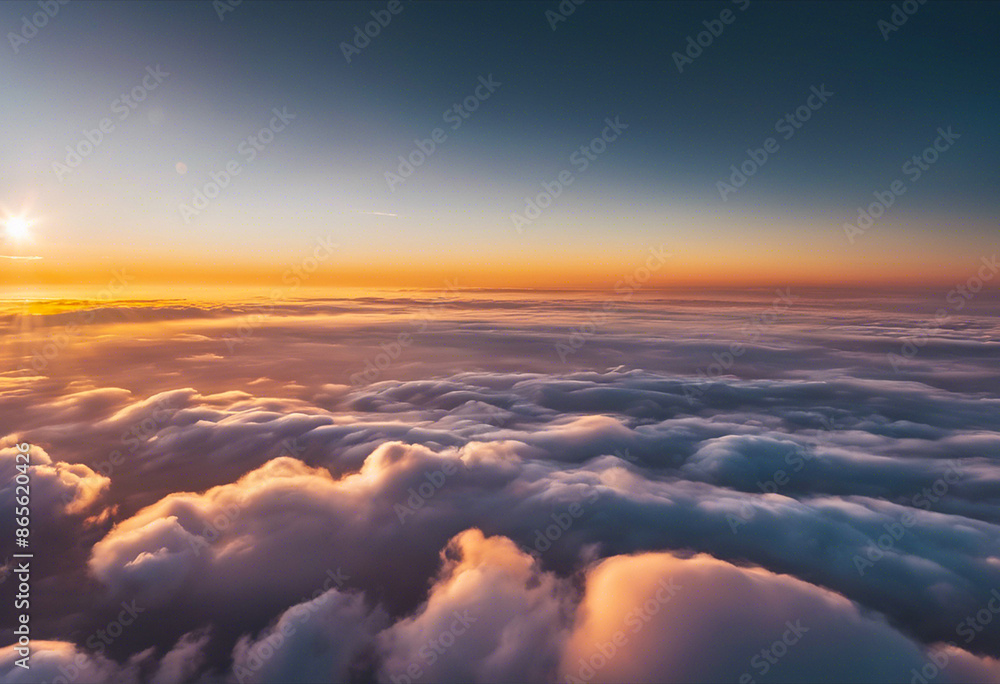 Fototapeta premium Sunrise seen above the clouds, above the cloud ceiling