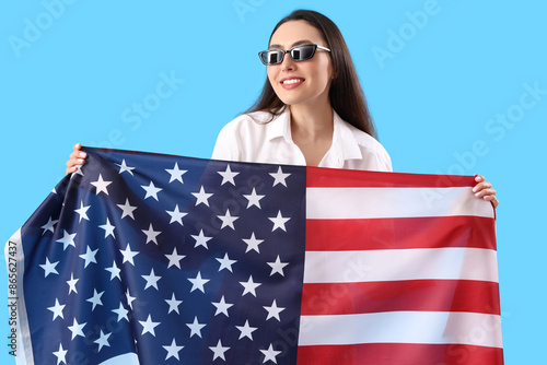 Young woman with USA flag o...