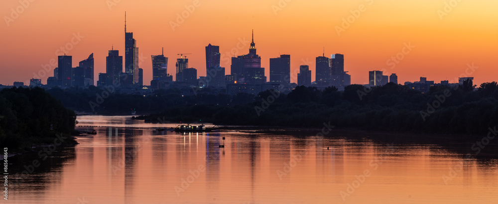 Fototapeta premium Panorama of Warsaw downtown skyline, Poland, over Vistula river during sunset