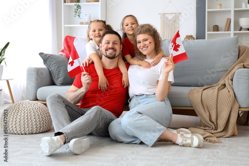 Happy family with flags of ...