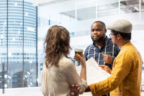 Photography Professionals and realtor planning an urban office space renovation for relocation, negotiating a property investment