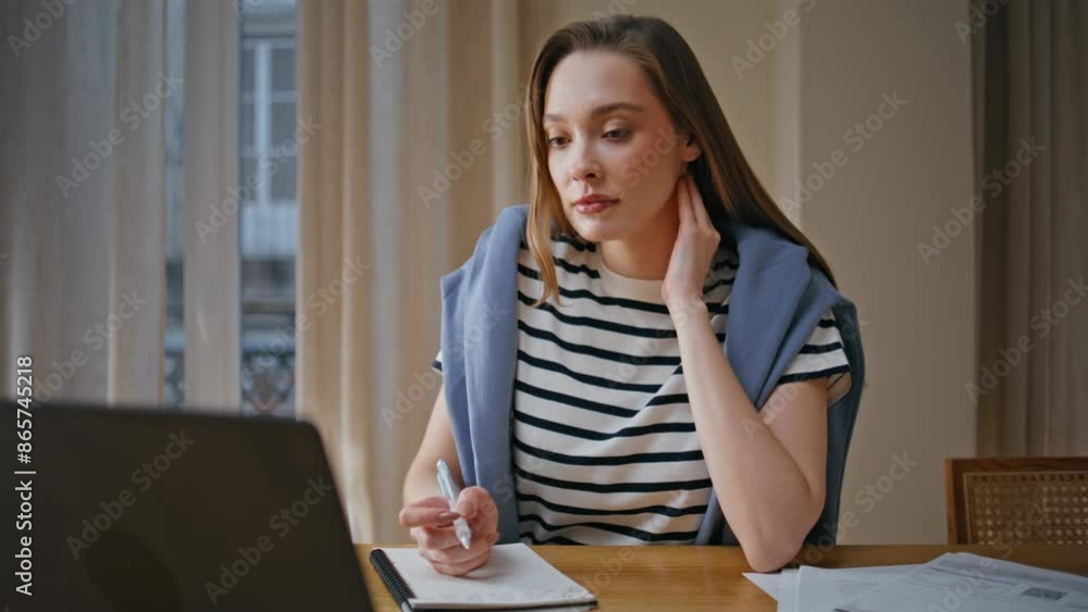 Professional tutor teaching online looking laptop web camera at home closeup. Professional tutor teaching online looking laptop web camera at home closeup.
