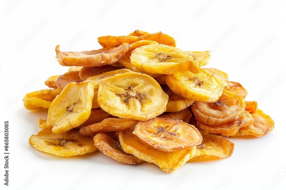 Pile of banana chips on white surface Pile of banana chips on white surface