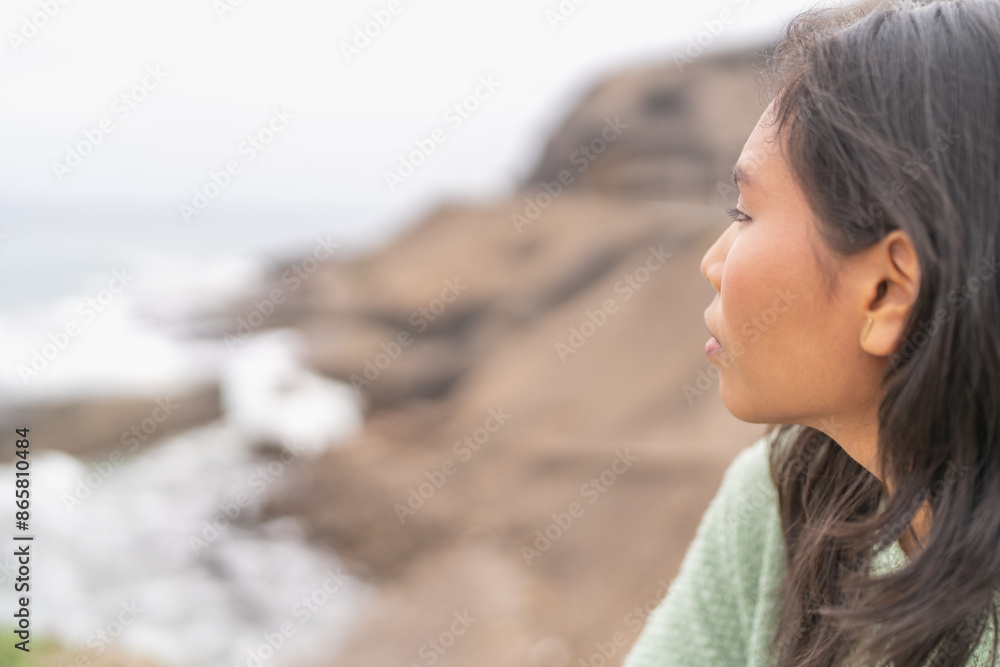 Latin beauty woman gazing the ocean from viewpoint Latin beauty woman gazing the ocean from viewpoint