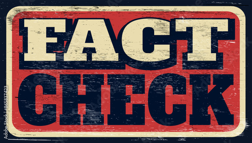 Aged vintage fact check sign on wood