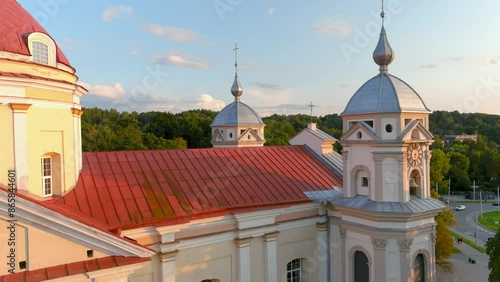 Aerial view of the Church of St. Peter and St. Paul, located in Antakalnis district in Vilnius. Beautiful summer evening in the capital of Lithuania. Summer city scenery in Vilnius, Lithuania. photo