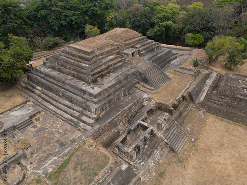 Aerial drone shot of the main pyramid with temple at Tazumal Park archaeological site in El Salvador. Travel, sightseeing concept.