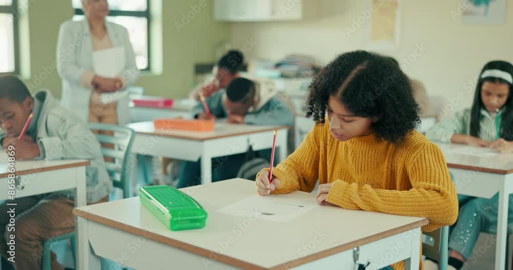 Exam, writing and students in classroom for group, test and knowledge in elementary school. Education, childhood development and desk for assessment, teacher and learning for young people in academy Exam, writing and students in classroom for group, test and knowledge in elementary school. Education, childhood development and desk for assessment, teacher and learning for young people in academy