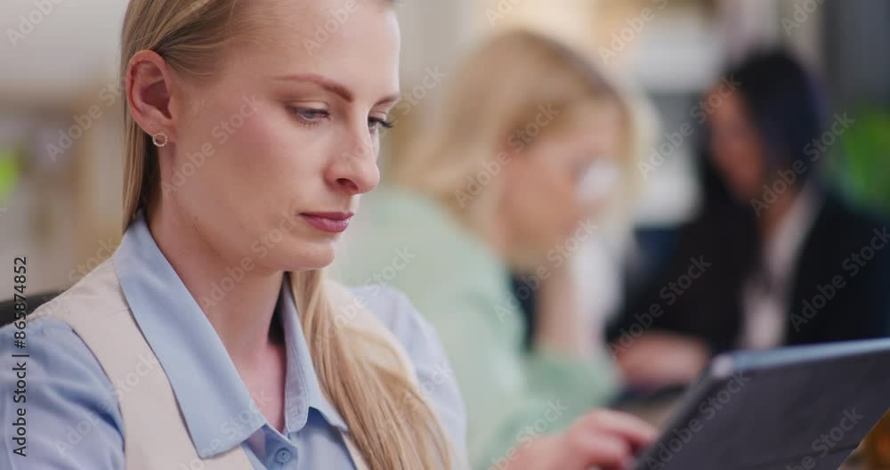 Concentrated Woman Working on Digital Tablet Concentrated Woman Working on Digital Tablet