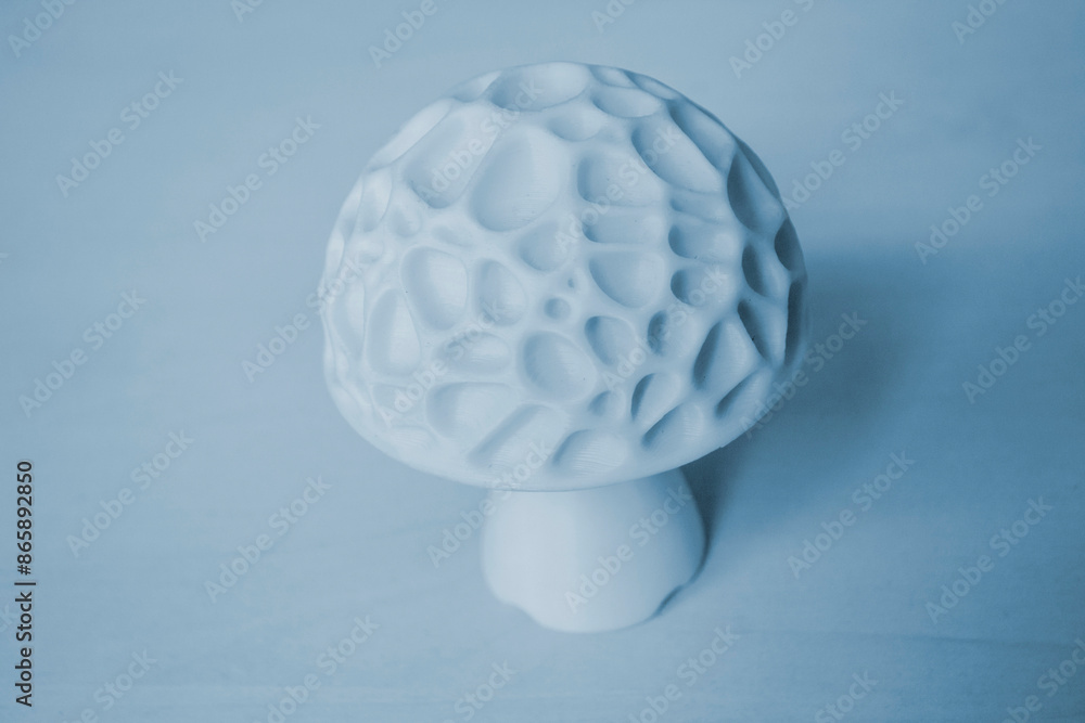Object in the form of mushroom of white color printed on a 3D printer. Three-dimensional model printed on a 3D printer from molten plastic of red color. Concept 3D Printing. FDM 3D Printing technology Object in the form of mushroom of white color printed on a 3D printer. Three-dimensional model printed on a 3D printer from molten plastic of red color. Concept 3D Printing. FDM 3D Printing technology