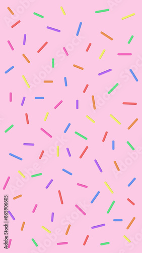 Colorful sprinkles scattered on a pink background
