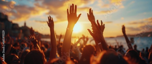 Crowd Raises Hands At Sunset Music Festival