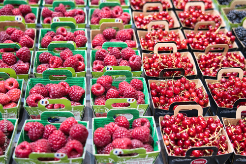 Nancy, France - June 19, 2024: raspberries sold at grocery shop in Nancy, Frane photo