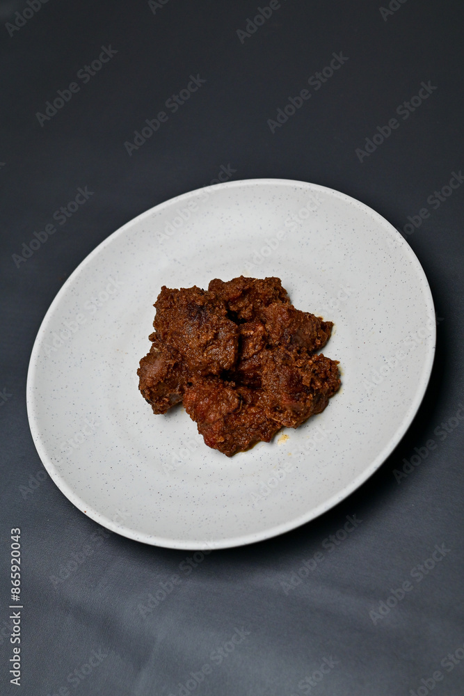 Asian Food Rendang is a rich and tender coconut beef stew from Indonesia, known for its slow-cooked process and complex flavors of coconut milk, lemongrass, and spices. It's a celebrated dish globally Asian Food Rendang is a rich and tender coconut beef stew from Indonesia, known for its slow-cooked process and complex flavors of coconut milk, lemongrass, and spices. It's a celebrated dish globally