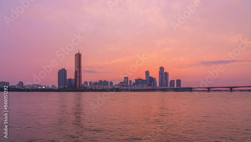 Timelapse in Seoul Stunning Transition from Daylight to City Lights big city skyline time-lapse shot South,Korea, high skyscrapers illumination reflected on Han river.Downtown cityscape  