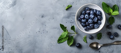 Bowl with fresh organic blu...