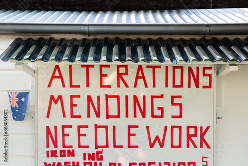 home made sign for an alterations business photo