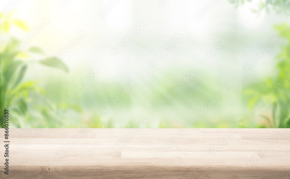 Wood table top on blur kitchen counter in morning background.beautiful abstract nature Wood table top on blur kitchen counter in morning background.beautiful abstract nature