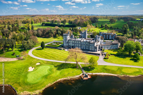 Dromoland Castle with golf course in County Clare on a summer day, Ireland