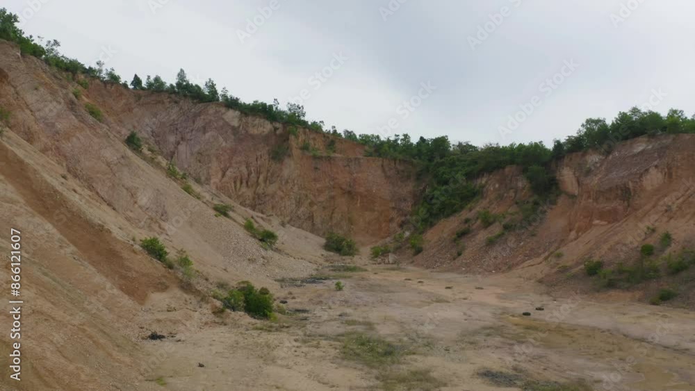 Aerial top view of ground in the land with sand in factory industry for construction site. Arid pattern texture background. Bulldozer tractor Aerial top view of ground in the land with sand in factory industry for construction site. Arid pattern texture background. Bulldozer tractor